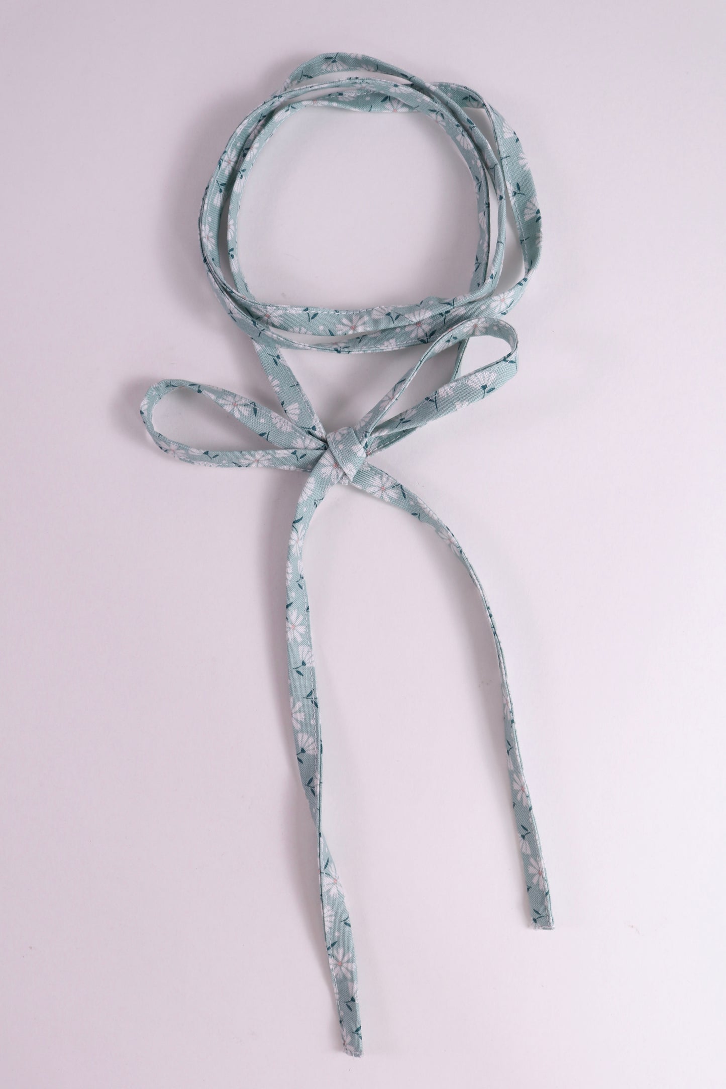 Blue Floral-patterned cotton tie.