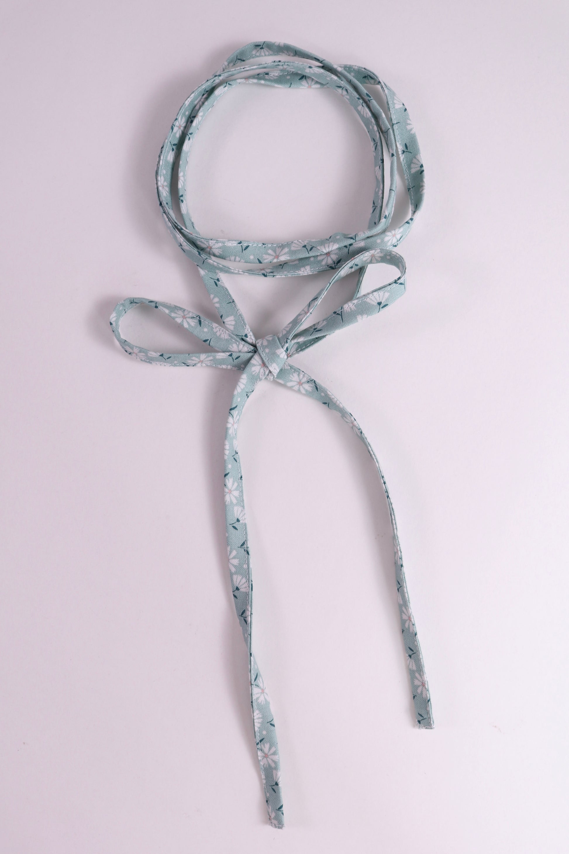 Blue Floral-patterned cotton tie.