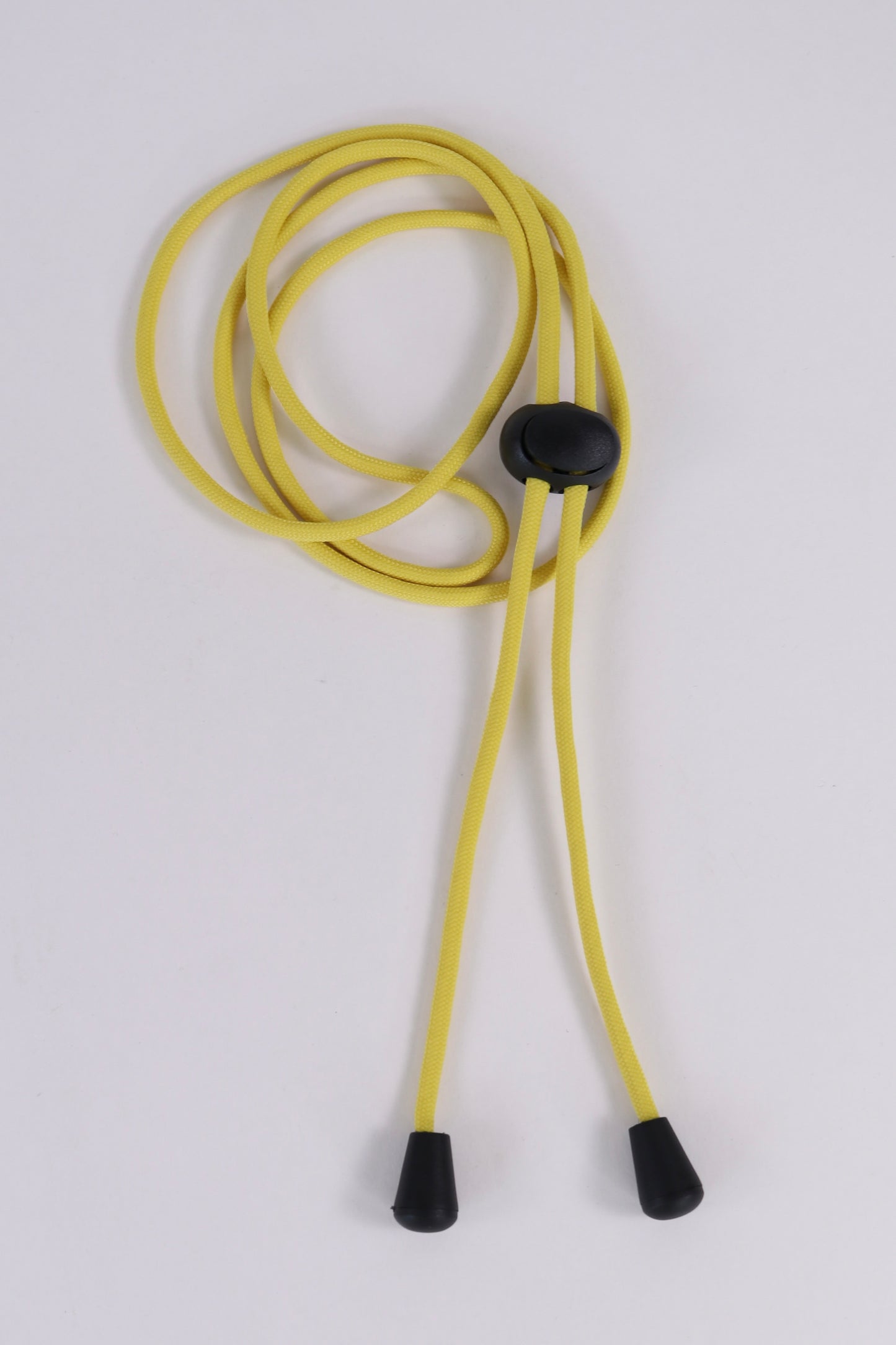 Yellow lanyard with black ends on a white background