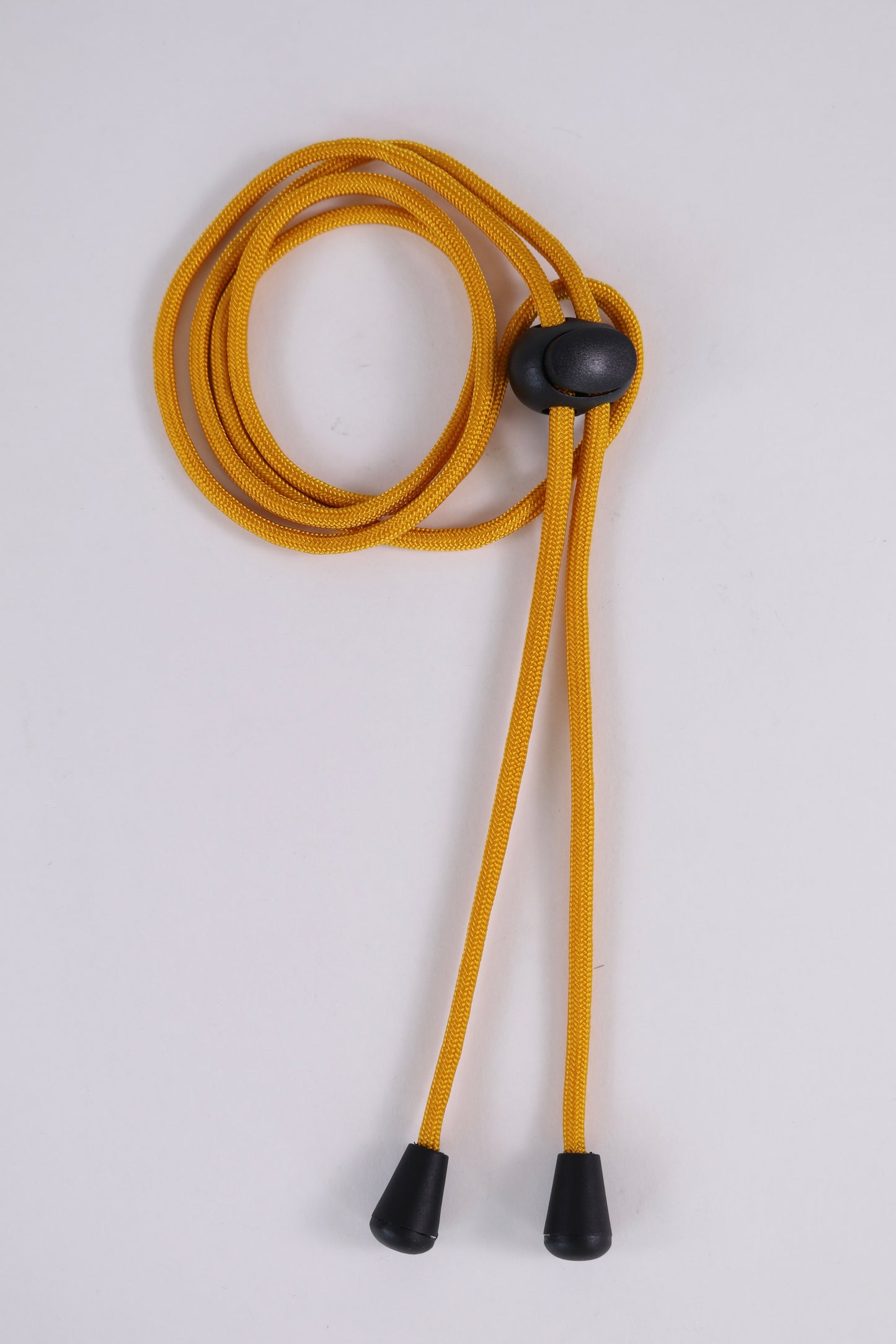 Yellow lanyard with black ends on a white background